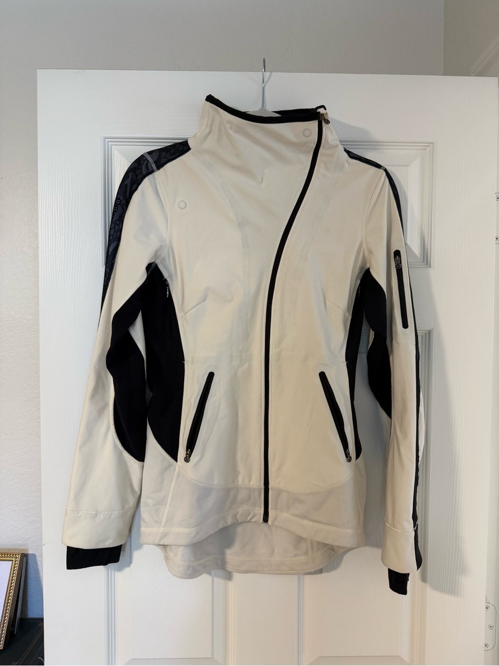 Women’s Cream and Black Asymmetrical Softshell Jacket mock neck